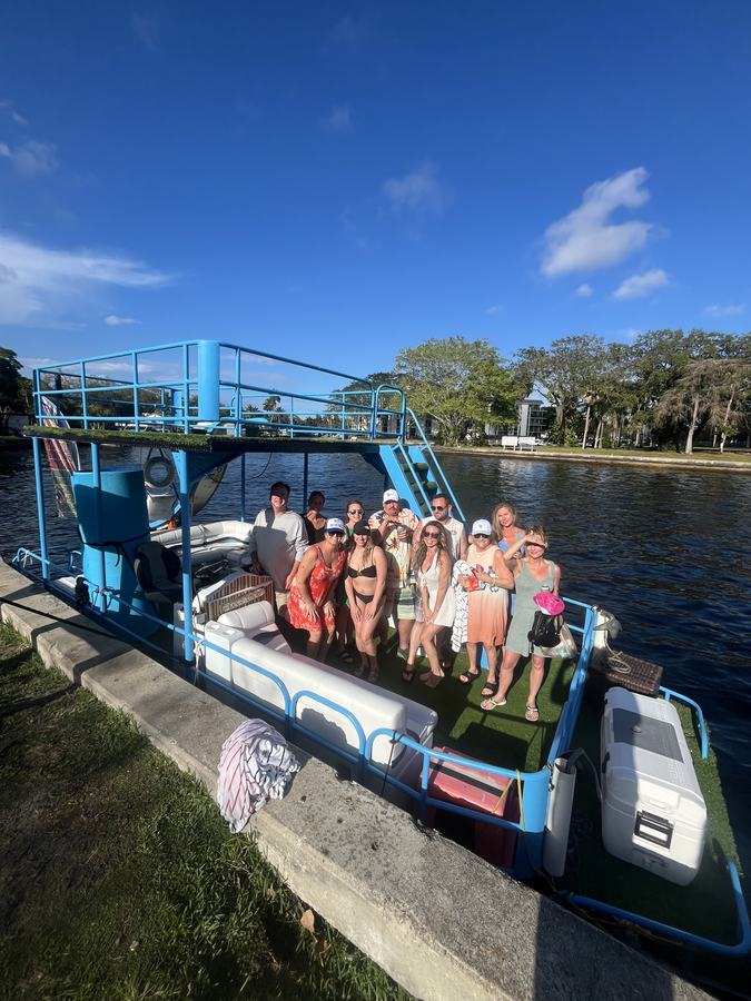 Boozy Barge 2.0 group at dock Fort Lauderdale Intracoastal waterway charter